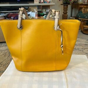 Michael Kors 12 x 16 x 5” golden yellow tote bag complete with charm